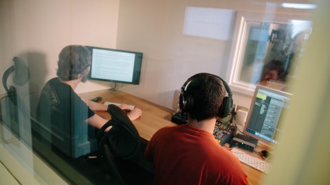 This image shows two people using the editing room available at Whitenoise Sound Studios, Belfast.